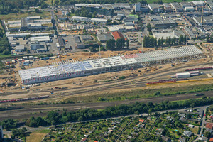  Im Kölner Stadtteil Nippes entsteht zurzeit das erste CO2-neutrale ICE-Instandhaltungswerk Deutschlands.  