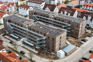  In Künzelsau sind 80 Wohneinheiten in ressourcenschonender Holzmodulbauweise und einem intelligenten Energiekonzept entstanden.  